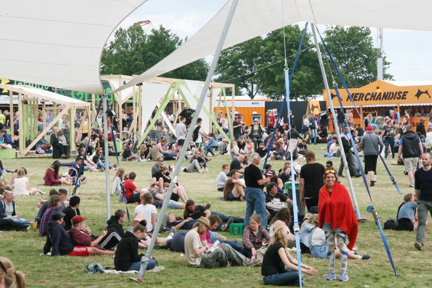 Festival-goers relaxing by Robin Elizabeth Herr